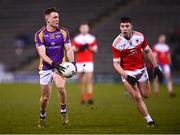 29 January 2022; Cian O'Connor of Kilmacud Crokes in action against Conor Daly of Pádraig Pearse's during the AIB GAA Football All-Ireland Senior Club Championship Semi-Final match between Pádraig Pearses, Roscommon, and Kilmacud Crokes, Dublin, at Kingspan Breffni in Cavan. Photo by David Fitzgerald/Sportsfile