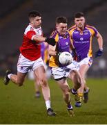 29 January 2022; Cian O'Connor of Kilmacud Crokes in action against Conor Daly of Pádraig Pearse's during the AIB GAA Football All-Ireland Senior Club Championship Semi-Final match between Pádraig Pearses, Roscommon, and Kilmacud Crokes, Dublin, at Kingspan Breffni in Cavan. Photo by David Fitzgerald/Sportsfile