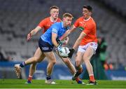 29 January 2022; Aaron Byrne of Dublin in action against Ciaran Mackin, left, and Rory Grugan of Armagh during the Allianz Football League Division 1 match between Dublin and Armagh at Croke Park in Dublin. Photo by Stephen McCarthy/Sportsfile