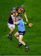 29 January 2022; Danny Sutcliffe of Dublin in action against Seamus Casey, left, and Diarmuid O'Keefe of Wexford during the Walsh Cup Final match between Dublin and Wexford at Croke Park in Dublin. Photo by Stephen McCarthy/Sportsfile