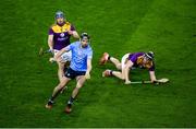 29 January 2022; Danny Sutcliffe of Dublin in action against Seamus Casey, left, and Diarmuid O'Keefe of Wexford during the Walsh Cup Final match between Dublin and Wexford at Croke Park in Dublin. Photo by Stephen McCarthy/Sportsfile