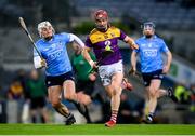 29 January 2022; Cathal Dunbar of Wexford in action against Andrew Dunphy of Dublin during the Walsh Cup Final match between Dublin and Wexford at Croke Park in Dublin. Photo by Stephen McCarthy/Sportsfile