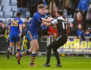 29 January 2022; Ian Maguire of St Finbarr's and Aidan Branagan of Kilcoo tussle off the ball during the AIB GAA Football All-Ireland Senior Club Championship Semi-Final match between St Finbarr's, Cork, and Kilcoo, Down, at MW Hire O'Moore Park in Portlaoise, Laois. Photo by Brendan Moran/Sportsfile