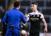 29 January 2022; Ceilum Docherty of Kilcoo, right shakes hands with Conor McCrickard of St Finbarr's after the AIB GAA Football All-Ireland Senior Club Championship Semi-Final match between St Finbarr's, Cork, and Kilcoo, Down, at MW Hire O'Moore Park in Portlaoise, Laois. Photo by Brendan Moran/Sportsfile