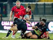 29 January 2022; Shane Daly of Munster is tackled by Marcello Violi of Zebre during the United Rugby Championship match between Zebre Parma and Munster at Stadio Sergio Lanfranchi in Parma, Italy. Photo by Roberto Bregani/Sportsfile