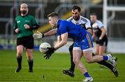 29 January 2022; Adam Lyne of St Finbarr's in action against Aidan Branagan of Kilcoo during the AIB GAA Football All-Ireland Senior Club Championship Semi-Final match between St Finbarr's, Cork, and Kilcoo, Down, at MW Hire O'Moore Park in Portlaoise, Laois. Photo by Brendan Moran/Sportsfile