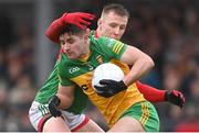 30 January 2022; Brendan McCole of Donegal in action against Ryan O’Donoghue of Mayo during the Allianz Football League Division 1 match between Mayo and Donegal at Markievicz Park in Sligo. Photo by Piaras Ó Mídheach/Sportsfile