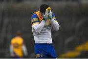 30 January 2022; Cathal Heneghan of Roscommon dries his face with his jersey before the Allianz Football League Division 2 match between Roscommon and Cork at Dr Hyde Park in Roscommon. Photo by David Fitzgerald/Sportsfile