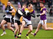 30 January 2022; Kevin O'Grady of Wexford in action against Keelan Cawley of Sligo during the Allianz Football League Division 4 match between Wexford and Sligo at Chadwicks Wexford Park in Wexford. Photo by Matt Browne/Sportsfile