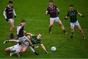 30 January 2022; Robert Finnerty of Galway has a shot at goal under pressure from Harry Hogan and Ronan Ryan of Meath during the Allianz Football League Division 2 match between Galway and Meath at Pearse Stadium in Galway. Photo by Seb Daly/Sportsfile
