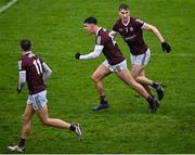 30 January 2022; Tomo Culhane of Galway, centre, celebrates after scoring his side's first goal during the Allianz Football League Division 2 match between Galway and Meath at Pearse Stadium in Galway. Photo by Seb Daly/Sportsfile