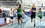 30 January 2022; Michael Lynch of An Ríocht AC, Kerry, 35, crosses the line to win the over 35 men's 200m, ahead of Michael Joyce of Le Chéile AC, Kildare, 31, who finished second, during the Irish Life Health National Masters Indoor Championships at TUS International Arena in Athlone, Westmeath. Photo by Sam Barnes/Sportsfile