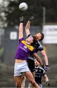 30 January 2022; Liam Coleman of Wexford in action against Conor Griffin of Sligo during the Allianz Football League Division 4 match between Wexford and Sligo at Chadwicks Wexford Park in Wexford. Photo by Matt Browne/Sportsfile