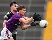 30 January 2022; Martin O'Connor of Wexford in action against Mikey Gordon of Sligo during the Allianz Football League Division 4 match between Wexford and Sligo at Chadwicks Wexford Park in Wexford. Photo by Matt Browne/Sportsfile