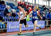 30 January 2022; John O'Loughlin of Crusaders AC, Dublin, left, and Enda Gavigan of LSA, competing in the over 55 men's 200m  during the Irish Life Health National Masters Indoor Championships at TUS Midlands Midwest Arena in Athlone, Westmeath. Photo by Sam Barnes/Sportsfile