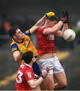 30 January 2022; Richard Hughes of Roscommon in action against Colm O'Callaghan of Cork during the Allianz Football League Division 2 match between Roscommon and Cork at Dr Hyde Park in Roscommon. Photo by David Fitzgerald/Sportsfile