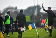 30 January 2022; Roscommon selector Peter Tormey is shown a yellow card by referee Seamus Mulhare during the Allianz Football League Division 2 match between Roscommon and Cork at Dr Hyde Park in Roscommon. Photo by David Fitzgerald/Sportsfile