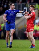 30 January 2022; Niall Kearns of Monaghan tussles with Conor Meyler of Tyrone during the Allianz Football League Division 1 match between Tyrone and Monaghan at O'Neill's Healy Park in Omagh, Tyrone. Photo by Brendan Moran/Sportsfile