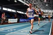 30 January 2022; John Fitzgibbon of Thurles Crokes AC, Tipperary, crosses the line to win the over 40 men's 3000m during the Irish Life Health National Masters Indoor Championships at TUS International Arena in Athlone, Westmeath. Photo by Sam Barnes/Sportsfile