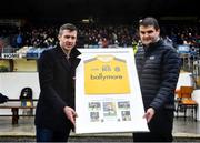 30 January 2022; Chairman of Roscommon GAA Brian Carroll, right, makes a presentation to former Roscommon footballer Cathal Cregg at half time during the Allianz Football League Division 2 match between Roscommon and Cork at Dr Hyde Park in Roscommon. Photo by David Fitzgerald/Sportsfile