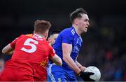 30 January 2022; Niall Kearns of Monaghan in action against Conor Meyler of Tyrone during the Allianz Football League Division 1 match between Tyrone and Monaghan at O'Neill's Healy Park in Omagh, Tyrone. Photo by Brendan Moran/Sportsfile