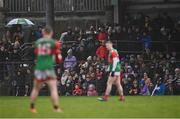 30 January 2022; Spectators look on as Ryan O'Donoghue of Mayo prepares to take a free during the Allianz Football League Division 1 match between Mayo and Donegal at Markievicz Park in Sligo. Photo by Piaras Ó Mídheach/Sportsfile
