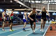 30 January 2022; Athletes from Omagh Harriers, Tyrone, pass the baton whilst competing in the Master's Men 4x200m relay during the Irish Life Health National Masters Indoor Championships at TUS International Arena in Athlone, Westmeath. Photo by Sam Barnes/Sportsfile