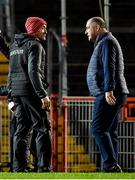 30 January 2022; Tyrone joint manager Brian Dooher, left, and Monaghan manager Seamus McEnaney speak after the Allianz Football League Division 1 match between Tyrone and Monaghan at O'Neill's Healy Park in Omagh, Tyrone. Photo by Brendan Moran/Sportsfile Photo by Brendan Moran/Sportsfile