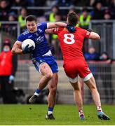 30 January 2022; Dessie Ward of Monaghan is tackled by Conn Kilpatrick of Tyrone during the Allianz Football League Division 1 match between Tyrone and Monaghan at O'Neill's Healy Park in Omagh, Tyrone. Photo by Brendan Moran/Sportsfile