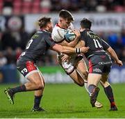 28 January 2022; Ethan McIlroy of Ulster is tackled by Tyler Morgan, left, and Ryan Conbeer of Scarlets during the United Rugby Championship match between Ulster and Scarlets at the Kingspan Stadium in Belfast. Photo by Ramsey Cardy/Sportsfile