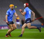 29 January 2022; Cian O'Callaghan of Dublin passes the sliothar to teammate Paddy Smyth, 6, during the Walsh Cup Final match between Dublin and Wexford at Croke Park in Dublin. Photo by Ray McManus/Sportsfile