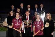 1 February 2022; Galway County Camogie Board has formally launched its ground-breaking sponsorship deal with Westerwood Global. Under the deal, Westerwood Global will pay Galway County Camogie Board €250,000 to secure sponsorship rights including branding rights for all county camogie teams including the Senior County Team who are current All Ireland champions. In attendance at the launch are Galway Camogie players, Dervla Higgins, left, and Aoife Donohue with Basil Holian, Chairman of Westerwood Global, centre, the O'Duffy Cup, and representatives from Galway Camogie County Board and Westerwood at The Galmont Hotel in Galway. Photo by Sam Barnes/Sportsfile