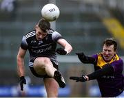 30 January 2022; David Quinn of Sligo in action against Michael Furlong of Wexford during the Allianz Football League Division 4 match between Wexford and Sligo at Chadwicks Wexford Park in Wexford. Photo by Matt Browne/Sportsfile