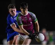 1 February 2022; Cathal Heneghan of NUI Galway in action against Joel B Walsh of Letterkenny IT during the Electric Ireland HE GAA Sigerson Cup Round 2 match between NUI Galway and Letterkenny IT at the Dangan Sports Campus in Galway. Photo by Piaras Ó Mídheach/Sportsfile