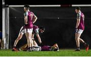 1 February 2022; Tommy Conroy of NUI Galway awaits medical attention for an injury during the Electric Ireland HE GAA Sigerson Cup Round 2 match between NUI Galway and Letterkenny IT at the Dangan Sports Campus in Galway. Photo by Piaras Ó Mídheach/Sportsfile