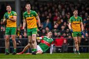 30 January 2022; Tommy Conroy of Mayo looks on after shooting, alongside Donegal players, from left, Paul Brennan, Caolan Ward and Ódhrán McFadden Ferry, during the Allianz Football League Division 1 match between Mayo and Donegal at Markievicz Park in Sligo. Photo by Piaras Ó Mídheach/Sportsfile