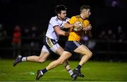 2 February 2022; Shea Ryan of DCU Dóchas Éireann in action against Thomas Galligan of Ulster University during the Electric Ireland HE GAA Sigerson Cup Quarter-Final match between DCU Dóchas Éireann and Ulster University at Dublin City University Sportsground in Dublin. Photo by Seb Daly/Sportsfile