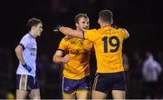 2 February 2022; Shane Walsh, left, and Karl Lynch Bissett of DCU Dóchas Éireann celebrate at the final whistle after their side's victory in the Electric Ireland HE GAA Sigerson Cup Quarter-Final match between DCU Dóchas Éireann and Ulster University at Dublin City University Sportsground in Dublin. Photo by Seb Daly/Sportsfile