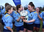 2 February 2022; UCD captain Alannah Boyle, centre, and teammates Leanne Mallen, left, and Grace Fennell celebrate with the Kay Bowen cup after the final of the Maxol Kay Bowen Cup between UCD and NUI Galway at Barnhall RFC in Leixlip, Kildare, which saw UCD victorious in an exciting  50 – 0 win. Photo by Brendan Moran/Sportsfile