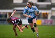 2 February 2022; Clare Gorman of UCD beats the tackle of Mia Williams of NUI Galway during the final of the Maxol Kay Bowen Cup between UCD and NUI Galway at Barnhall RFC in Leixlip, Kildare, which saw UCD victorious in an exciting  50 – 0 win. Photo by Brendan Moran/Sportsfile