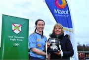 2 February 2022; UCD captain Alannah Boyle is presented with the Kay Bowen cup by Kay Bowen after the final of the Maxol Kay Bowen Cup between UCD and NUI Galway at Barnhall RFC in Leixlip, Kildare, which saw UCD victorious in an exciting  50 – 0 win. Photo by Brendan Moran/Sportsfile