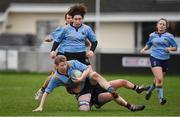 2 February 2022; Emma Costello of UCD is tackled by Sarah Cousins of NUI Galway during the final of the Maxol Kay Bowen Cup between UCD and NUI Galway at Barnhall RFC in Leixlip, Kildare, which saw UCD victorious in an exciting  50 – 0 win. Photo by Brendan Moran/Sportsfile