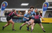 2 February 2022; Emma Costello of UCD is tackled by Aisling Hahessy, left, and Sarah Cousins of NUI Galway during the final of the Maxol Kay Bowen Cup between UCD and NUI Galway at Barnhall RFC in Leixlip, Kildare, which saw UCD victorious in an exciting  50 – 0 win. Photo by Brendan Moran/Sportsfile