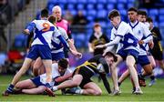 3 February 2022; (EDITORS NOTE; This image contains graphic content) Luke Kennedy of St Patricks Classical School is tackled as his head hits the knee of Charlie O'Keefe of St Andrews College, right, during the during the Bank of Ireland Father Godfrey Cup 2nd Round match between St Andrews College, Dublin, and St Patricks Classical School, Navan at Energia Park in Dublin. Photo by Ben McShane/Sportsfile