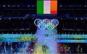 4 February 2022: Team Ireland flagbearers Brendan Newby, left, and Elsa Desmond carry the Irish tricolour ahead of their teammates during the opening ceremony of the Beijing 2022 Winter Olympic Games at National Stadium in Beijing, China. Photo by Ramsey Cardy/Sportsfile