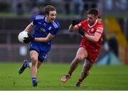 30 January 2022; Jack McCarron of Monaghan in action against Liam Rafferty of Tyrone during the Allianz Football League Division 1 match between Tyrone and Monaghan at O'Neill's Healy Park in Omagh, Tyrone. Photo by Brendan Moran/Sportsfile