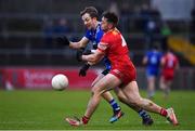30 January 2022; Jack McCarron of Monaghan in action against Liam Rafferty of Tyrone during the Allianz Football League Division 1 match between Tyrone and Monaghan at O'Neill's Healy Park in Omagh, Tyrone. Photo by Brendan Moran/Sportsfile