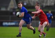 30 January 2022; Mícheál Bannigan of Monaghan in action against Nathan Donnelly of Tyrone during the Allianz Football League Division 1 match between Tyrone and Monaghan at O'Neill's Healy Park in Omagh, Tyrone. Photo by Brendan Moran/Sportsfile