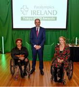 4 February 2022; An Taoiseach Micheál Martin TD, centre, with President of Paralympics Ireland Eimear Breathnach, right, and Powerlifting athlete Britney Arendse during the Paralympics Ireland Tokyo 2020 Awards at Dublin Castle in Dublin. Photo by David Fitzgerald/Sportsfile