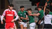 4 February 2022; Chay Mullins of Ireland, centre, celebrates scoring his side's first try during the U20 Six Nations Rugby Championship match between Ireland and Wales at Musgrave Park in Cork. Photo by Piaras Ó Mídheach/Sportsfile